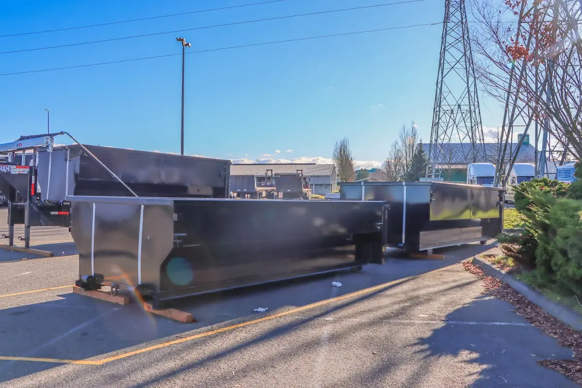 Roll-off dumpster ready for waste disposal at job site for Concrete Dumpster Rental in Meadowbrook